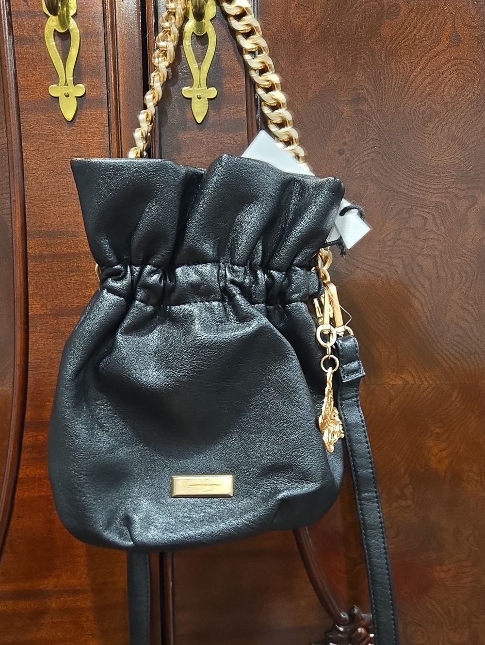 Jessica simpson Black Drawstring Shoulder Bag with Gold Chain Accent
